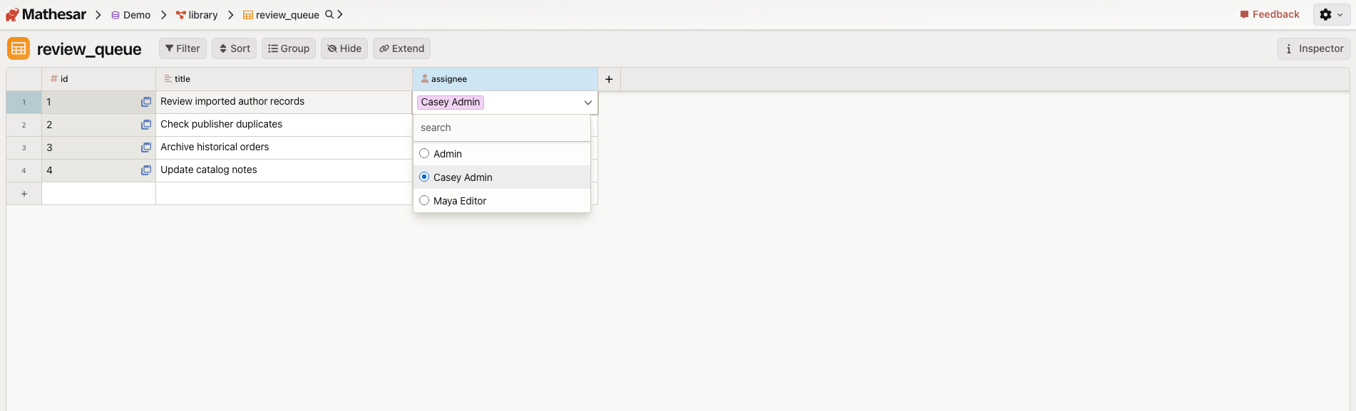 Mathesar table showing a User column dropdown with database collaborators Admin, Casey Admin, and Maya Editor.